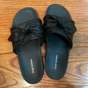Black Stuart Weitzman slides
